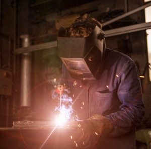 Welder soldering iron in workshop